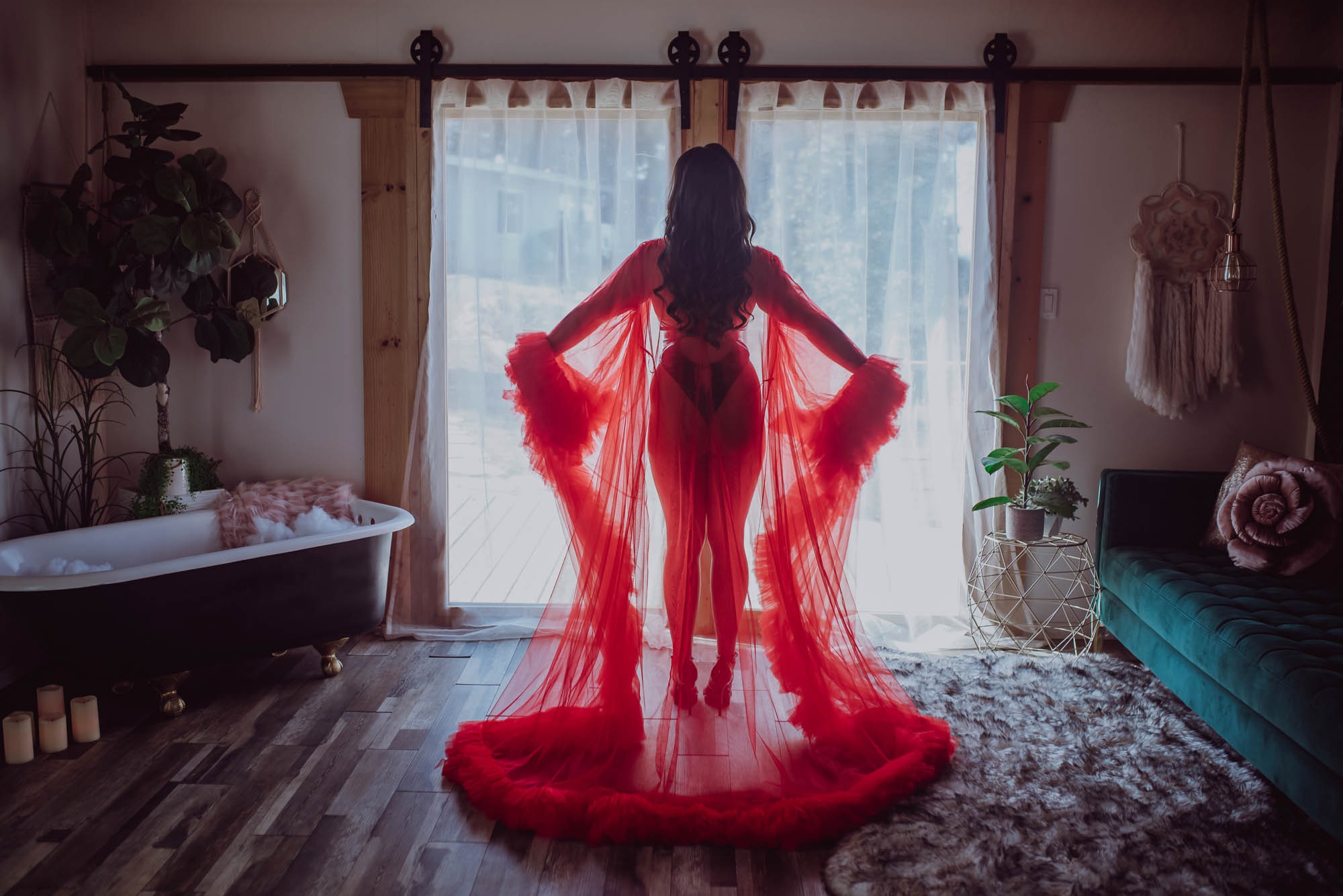 Beautiful woman in a gorgeous red robe exuding confidence